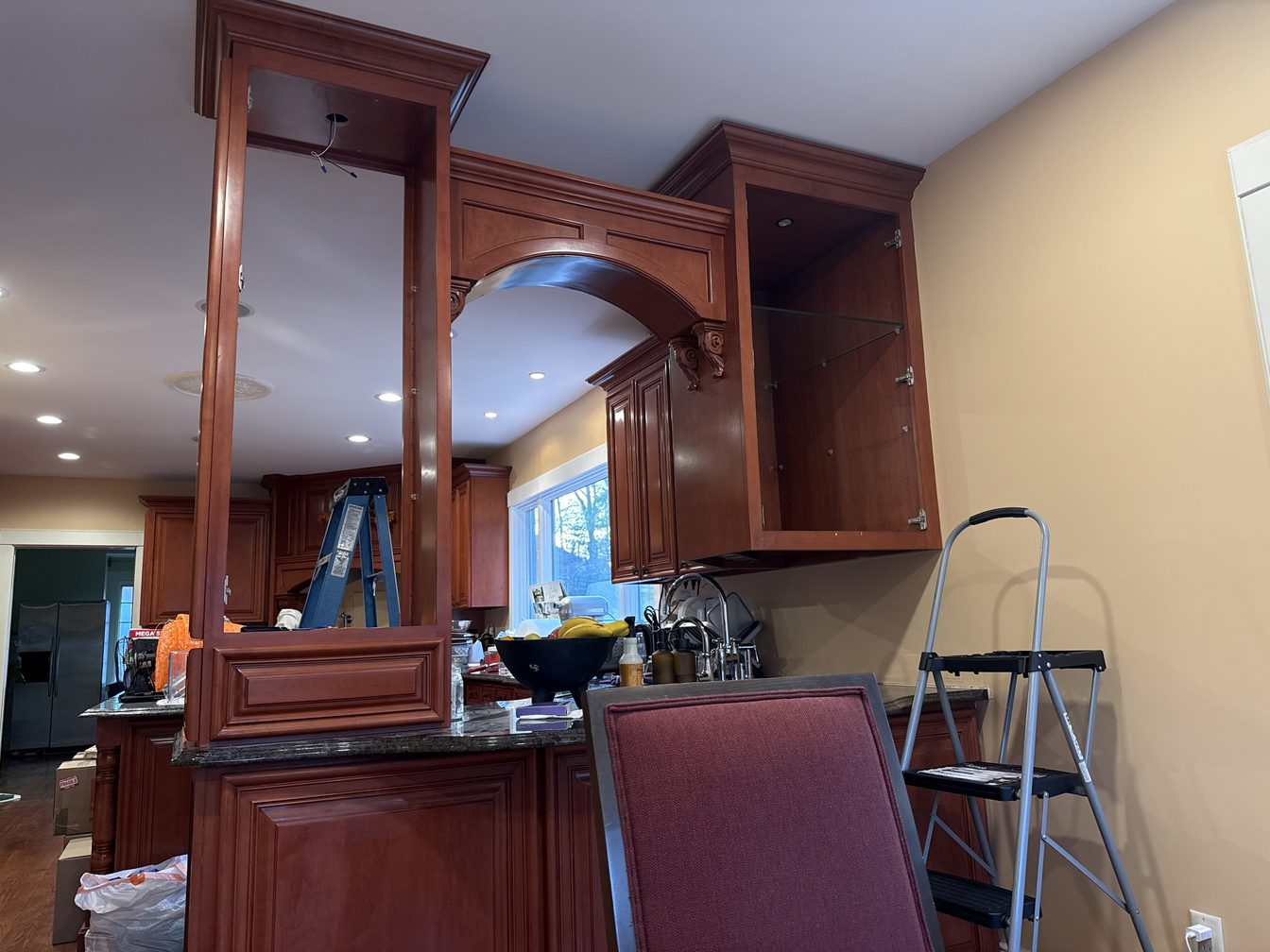 Kitchen — before staging, cabinetry and open shelving detail